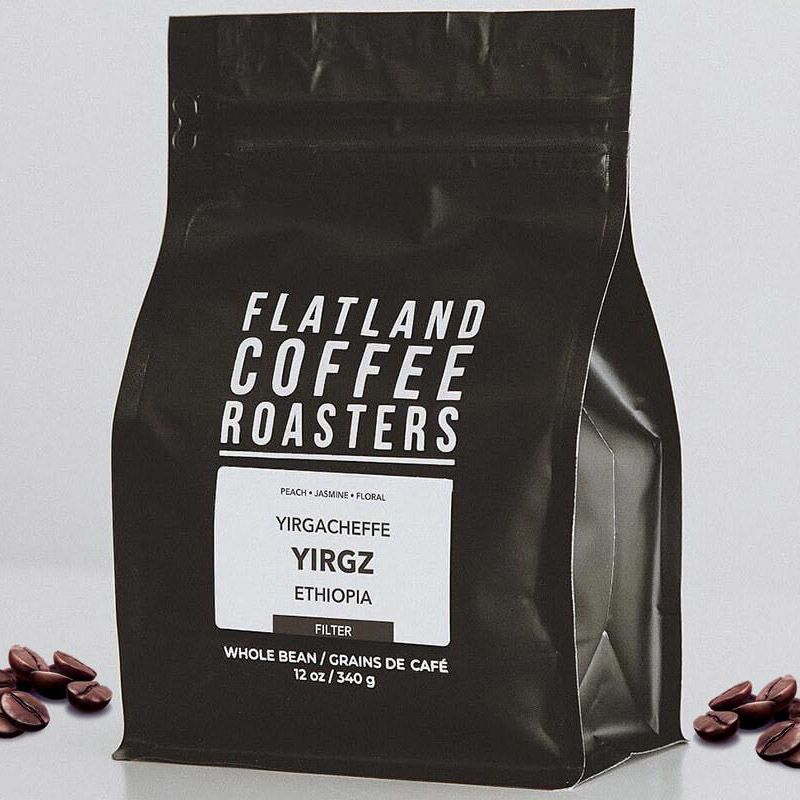 Borsa con cerniera a soffietto laterale caffè con sfondo nero